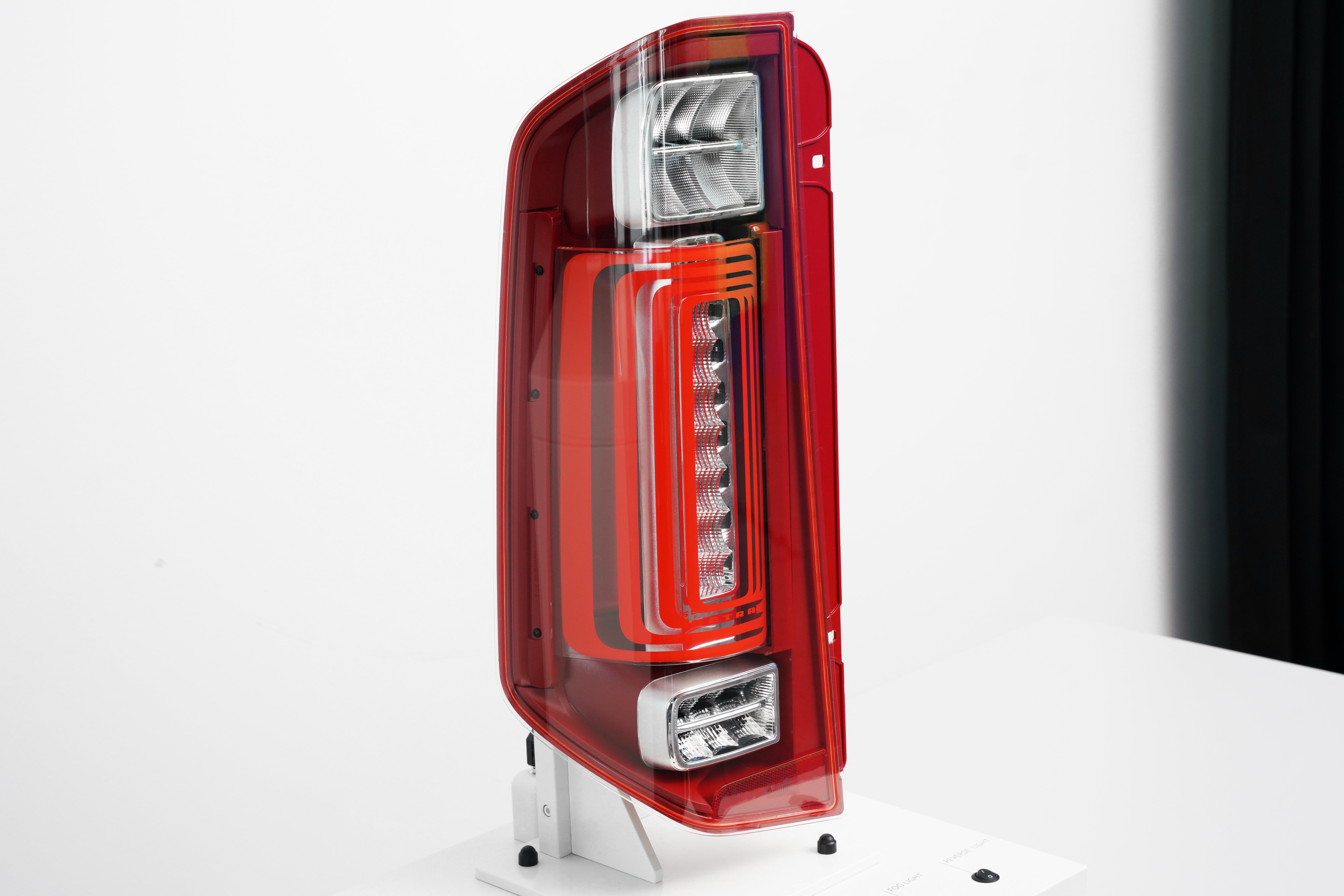 A customised light signature in the tail light brings the brand identity to the road.