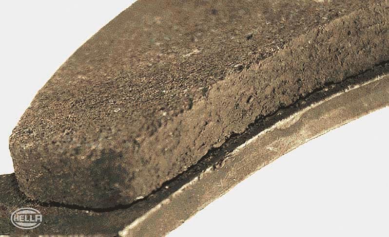 Failure modes of brake pads: Friction lining comes loose from the base plate