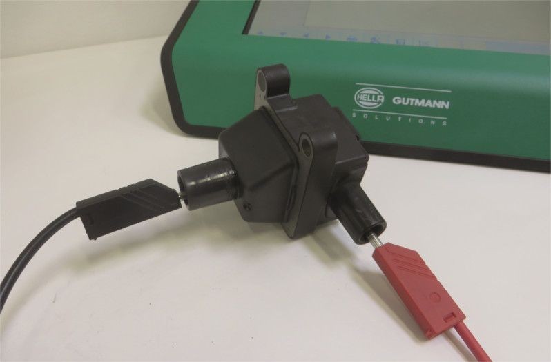 Measure the ignition coil: Connect test probes to high-voltage outputs of the ignition coil