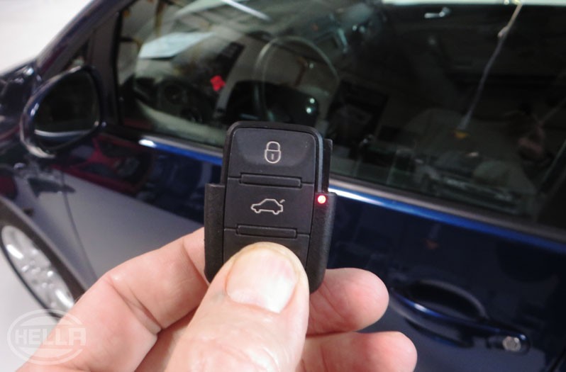 Coding or programming the car key: Press the unlock button